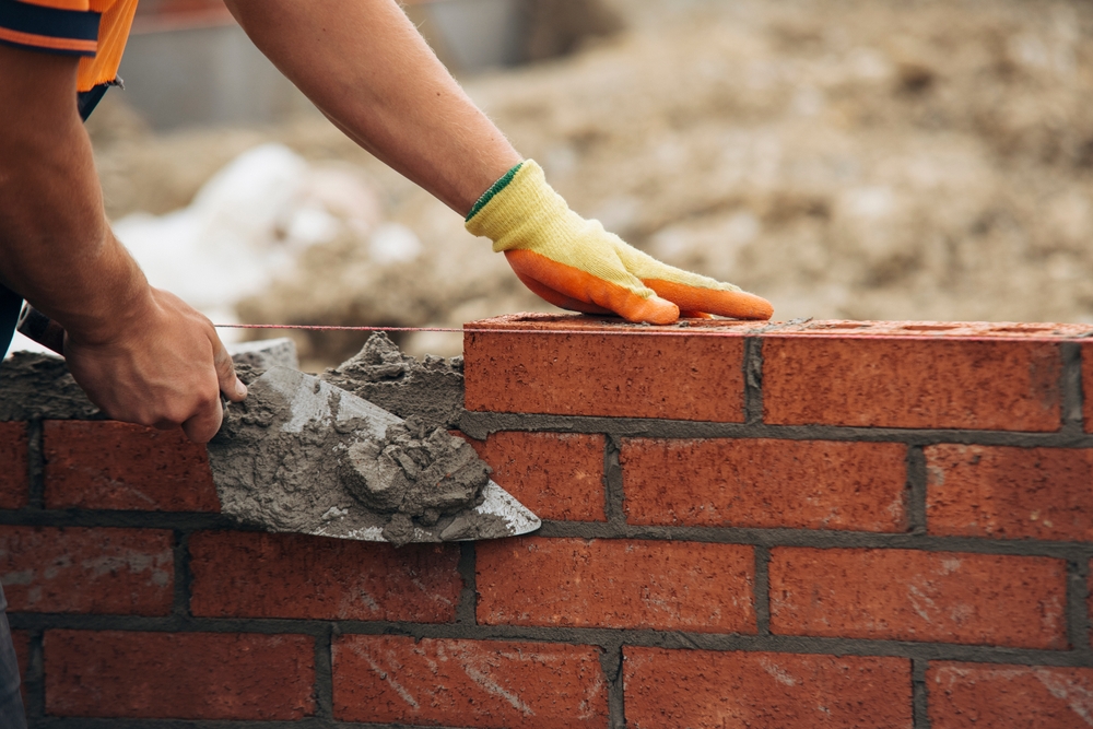 Builders in Romford inspecting plans